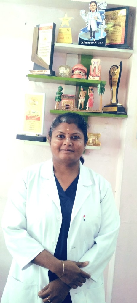 Dr. Thangam with her awards