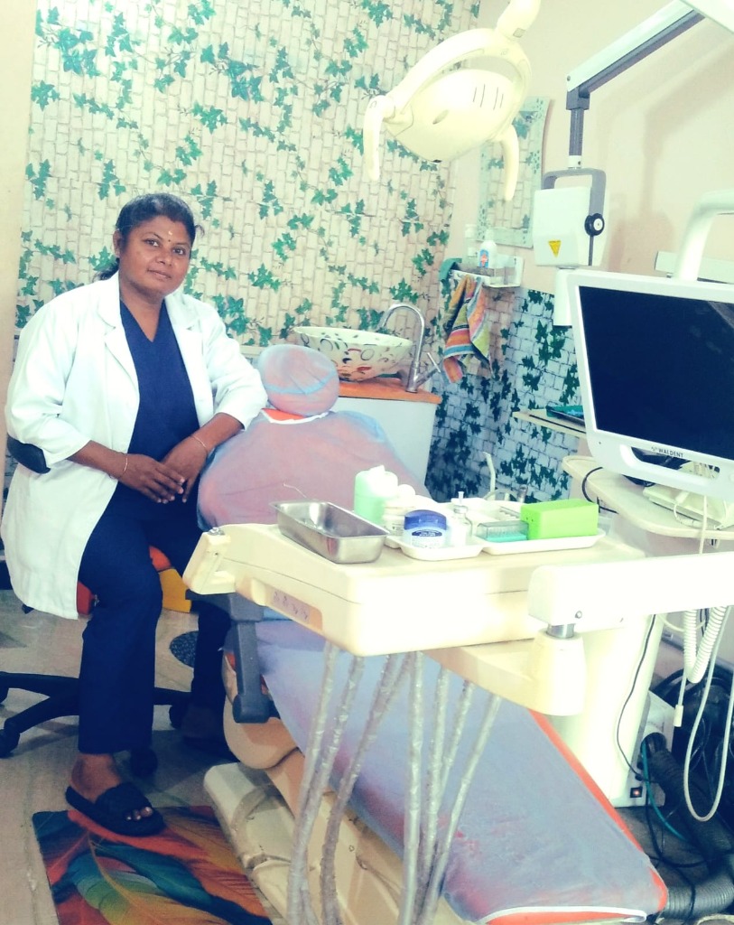 Dr. Thangam with clinical equipment